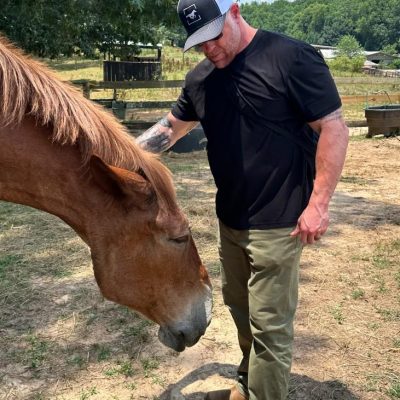 A man and horse at our rehabs in Georgia.