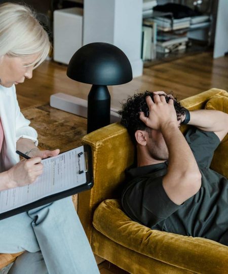 Man talking to therapist in Rapid Resolution Therapy in Georgia.